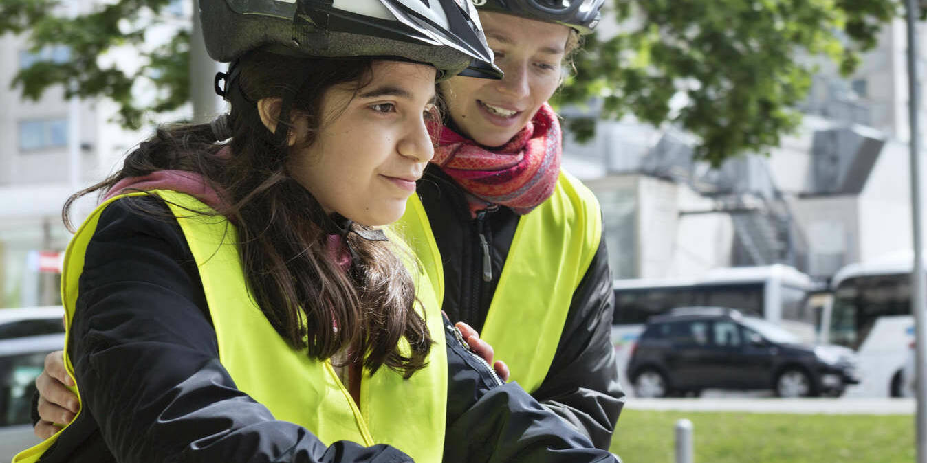 Anfänger:in am Fahrrad